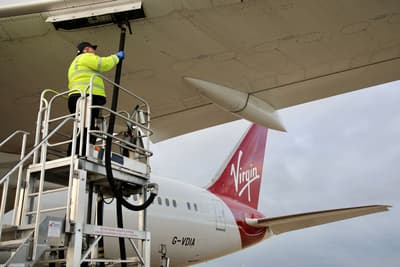 A technician fills Virgin Atlantic plane with biofuel before a demonstration flight last year. 