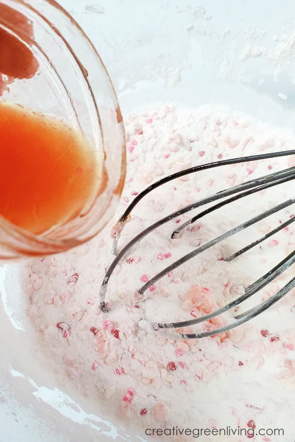 How to make DIY bath bombs with epsom salt and essential oils mix together wet and dry ingredients to make bath bombs