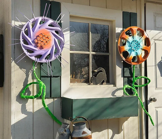Garden Flowers Using Hub Caps from 365 Days of Crafts
